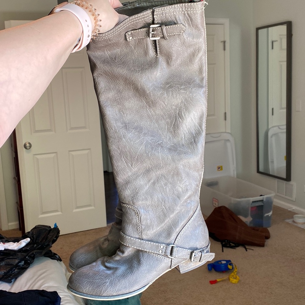 Grey distressed boots
